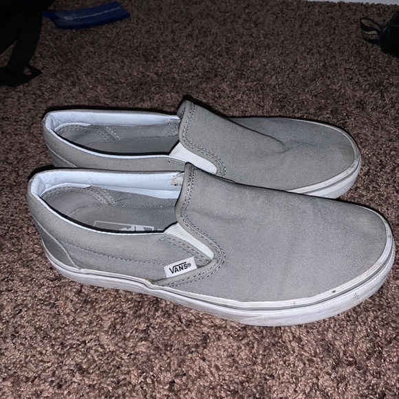 light gray slip on vans